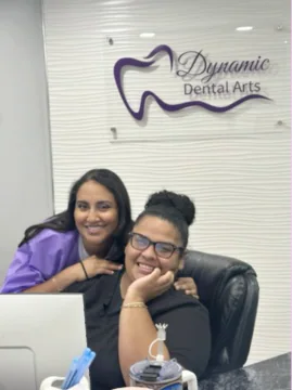 Dynamic Dental Arts team members sharing a moment in the office