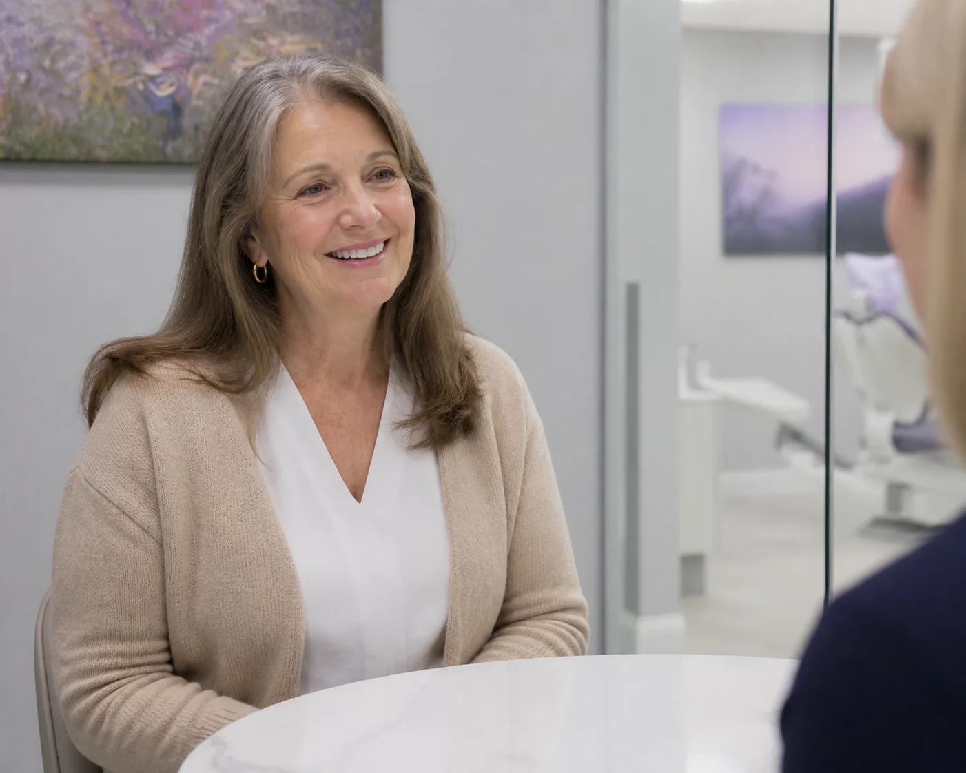 Mature woman smiling comfortably in natural light